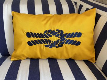 Подушка декоративна жовта з вишитим морським вузлом 33х50см.